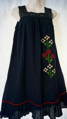 This is an Authentic Turkish hand sewed loose flowy women summer dress made with 100% cotton. Made from a special handmade garment in Turkey for over 150 years called "Sile Bezi".  + It's a short shoulder strap black dress with red and yellow Turkish flower motifs.  + For best fit please see below for fit measurements + Please note that the dress comes with special washing instructions. It's perfect for hot summer days. It's very light and airy. Can be dressed at the beach or casually during day Black Folk Style Summer Dress, Folk Style Cotton Floral Print Dress, Folk Style Cotton Dress With Floral Print, Black Peasant Dress For Summer, Black Folk Style Beach Dress, Cotton Peasant Dress For Beach, Cotton Peasant Dress For The Beach, Bohemian Cotton Sundress With Floral Embroidery, Black Folk Style Cotton Dress