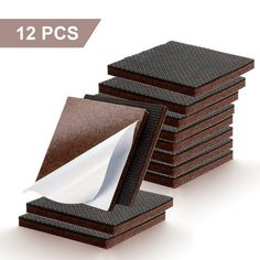 a stack of brown and white paper sitting on top of each other