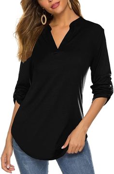 This blouse is super versatile, the perfect tunic for dressing up or dressing down. This is a casual, comfy blouse that's great for running errands, but professional enough to wear to work or a Zoom meeting. It's a flowy, relaxed cut that skims away from the body. Pair with your favorite slacks for a professional look, or jeans or leggings for a night out. Flows away from body Relaxed fit, size down for a fitted look Long tunic length, 3/4 roll tab sleeves 65% cotton, 35% polyester Machine wash How To Wear Kimono, Business Casual Blouse, Comfy Blouse, V Neck Tunic, Long Tunic Tops, Sleeveless Tunic, Long Tunic, Tunic Blouse, Casual Fall Outfits