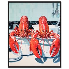 three red lobsters are in a white bowl