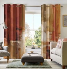 a living room filled with furniture and curtains