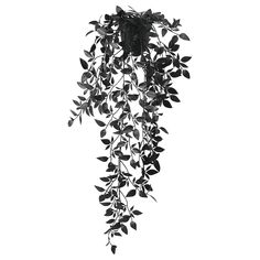 a black and white photo of leaves hanging from a clock