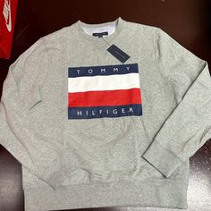 Tommy Hilfiger Mens Gray Long Sleeve Fleece Pullover Sweatshirt Size Large Brand: Tommy Hilfiger Department: Men Size: L Color: Gray Type: Sweatshirt Style: Pullover Pattern: Heather Theme: Classic Neckline: Mock Neck Season: Fall Winter Features: Comfort, Breathable Sleeve Length: Long Sleeves Condition: New With Tag I Offer Discounts For All Return Customers. - Jvs Winter Tommy Hilfiger Sweatshirt With Letter Print, Tommy Hilfiger Letter Print Winter Sweatshirt, Tommy Hilfiger Letter Print Sweatshirt For Winter, Tommy Hilfiger Long Sleeve Streetwear Tops, Tommy Hilfiger Sporty Cotton Sweatshirt, Tommy Hilfiger Crew Neck Winter Sweatshirt, Tommy Hilfiger Crew Neck Sweatshirt For Streetwear, Tommy Hilfiger Winter Sweatshirt With Ribbed Cuffs, Tommy Hilfiger Sporty Letter Print Sweatshirt