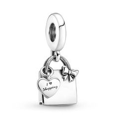 Product info: -WARNING: Words on the charm are considerably tiny! Only purchase if you are comfortable -925 Sterling Silver -Fits pandora bracelets Pandora Shopping Bag, Pandora Travel, Pandora Bracelet Charms Ideas, Stockholm Stil, Pandora Logo, Heart Shaped Bag, Bday Gifts, Pandora Jewelry Charms, Charms Pandora