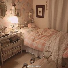 a bedroom with a bed, dresser and mirror in the corner next to a lamp