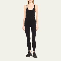 Tracy Anderson seamless active jumpsuit features stretch ladder trim Scoop neckline with a ruched center seam Adjustable straps Scoop back Full length Second-skin fit  Polyester Made in Italy Seamless Scoop Neck Bodysuit In Athleisure Style, Athleisure Seamless Scoop Neck Bodysuit, Seamless Scoop Neck Bodysuit For Workout, Seamless Micro-elastic Yoga Bodysuit, Seamless Micro-elastic Bodysuit For Yoga, Seamless Second-skin Elastane Activewear, Compressive Seamless Unitard For Athleisure, Compressive Seamless Athleisure Jumpsuits And Rompers, Sporty Scoop Neck Seamless Bodysuit