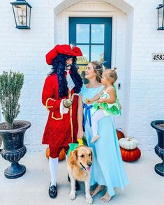 two women and a child are dressed up as peter panton and the little mermaid