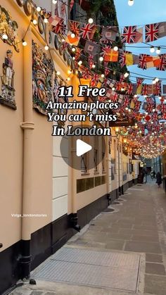 the street is lined with flags and lights that read 11 free amazing places you can't miss in london