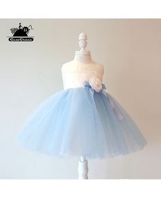 Shop Sky Blue Tulle Ballgown Couture Flower Girl Dress Summer Weddings online. Super cute styles with couture high quality. Pro since 2009. Light Blue Fitted Princess Dress For Wedding, Blue Tulle Wedding Gown, Blue Wedding Gown With Tulle Skirt, Light Blue Princess Style Wedding Dress, Elegant Blue First Communion Dress, Blue Tulle Ball Gown For Wedding, Elegant Blue Dress For First Communion, Blue Organza Ball Gown With Tulle Skirt, Blue Princess Dress For First Communion