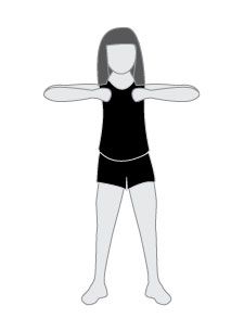 a woman is standing with her arms spread out to the side, and she's wearing black shorts