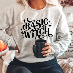 This shirt is for all of us who embrace being a Basic Witch. Celebrate being a witch, embrace the spooky and get your Vibes on with this cute Halloween Sweatshirt. This  sweatshirt  is great for any girl of any age, whether you're a tween, teen or an adult! This Basic Witch Vibes top is super soft and lightweight, with a bit of stretch for the perfect fit. It's a casual fit that's great for dressing up. This would be perfect paired with leggings and boots or jeans. You will love this fun and fes Witchy Letter Print T-shirt For Fall, Fitted Halloween T-shirt With Crew Neck, Halloween Sweatshirt For Women, Being A Witch, Witchy Crew Neck T-shirt For Fall, Fall Witchy Crew Neck T-shirt, Preppy Halloween, Basic Witch Shirt, Preppy Sweatshirts