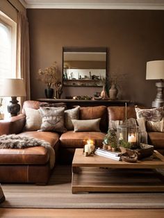 a living room filled with lots of furniture next to a fire place and a mirror