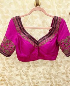 Hand embroidered ready made saree blouse / crop top/stitched saree blouse usa /  hot pink saree blouse/ hand embroidered blouse/zardosi blouse/pink saree blouse/ pure silk blouse/ maggam work blouse        It is very true that a perfect blouse is the one which makes your saree look stand out !! If you find one of such a style that you have been wanting to have then dont let it go !! we carry such unique trending blouses that instantly add a stylish look to any saree !!     Well..!! we understand that you may not get in your desired size/pattern, here you go with customization according to your size/pattern which we can deliver in 1-2 weeks of time period !!      Here is a beautiful Hand embroidered saree blouse in hot pink color that has heavy intricate embossed zardosi hand embroidery on Pink Raw Silk Blouse Piece With Intricate Embroidery, Festive Pink Blouse With Intricate Embroidery, Pink Embroidered Fabric With Unstitched Blouse For Designer Wear, Pink Fitted Silk Thread Traditional Wear, Fitted Pink Silk Thread Traditional Wear, Fitted Pink Traditional Wear In Silk Thread, Embroidered Pink Raw Silk Blouse Piece, Pink Art Silk Blouse With Resham Embroidery, Pink Silk Blouse Piece With Intricate Embroidery