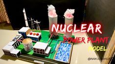 a model of a nuclear power plant with the words nuclear power plant on it