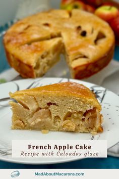 a piece of french apple cake on a plate with a slice cut out and ready to be eaten