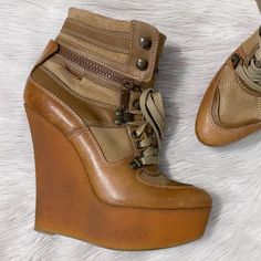 Burberry Tayport Wedge Platform Boots Authentic Suede Trim Tan Leather Upper Functional Zipper Lace Up Shearling Lined There Is Some Discoloration On The Heels, Pictured In The Last Photo. Otherwise In Good Condition. Approximate Measurements: Heel Height 5.25 Inches, Platform Height 1.5 Inches, Shaft Height 4.5 Inches Size 36 (Us 6) Item C16 Fall Autumn Winter Designer Luxury Y2k Gaudy Neutral Streetwear Luxury Brown Wedge Heel Boots, Brown High-top Wedge Boots With Platform, Brown Suede Platform Wedge Boots, High-top Suede Wedge Boots, Brown High-top Shearling Boots, Burberry Shoes, Womens Shoes Wedges, Platform Wedges, Tan Brown