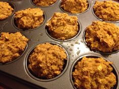 a muffin tin filled with lots of carrots