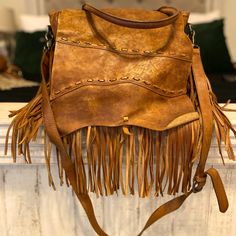 Boutique Find Genuine Leather Pristine Condition Bohemian Leather Shoulder Bag For Errands, Leather Bohemian Shoulder Bag For Errands, Bohemian Leather Top Handle Bag, Bohemian Leather Shoulder Bag With Detachable Handle, Brown Leather Shoulder Bag With Fringe, Brown Bohemian Satchel With Fringe, Brown Leather Fringe Shoulder Bag, Bohemian Leather Fringe Satchel, Western-themed Brown Leather Shoulder Bag