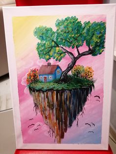 a painting of a house sitting on top of a small island with a tree growing out of it