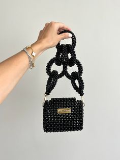 Bead bags are 100% handmade. It has 2 different uses. You can use it as a handbag or crossbody bag. The bags will come with a special pouch, you can easily store them. The phone does not fit inside. You can carry lipstick, a card holder. It will come with 2 straps. * Dimensions - Width: 13cm - Height: 9cm - Depth: 4cm - Cross strap length 108 cm * Materials - Luxury Plated Pearl - Gold hook - Gold label * Transport - Ships from Istanbul, Turkey to anywhere in the world. - Production time before Trendy Beaded Clutch Shoulder Bag, Trendy Handheld Evening Bag, Handmade, Gift Black Beaded Shoulder Bag, Trendy Handheld Beaded Evening Bag, Rectangular Bag With Black Beads As Fashion Accessory, Beaded Shoulder Bag Clutch, Handmade Square Evening Box Bag, Rectangular Bag With Beaded Chain For Gift, Rectangular Bags With Beaded Chain For Gift