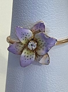 Fine, handcrafted flower ring ~ Created by transforming a vintage stick pin, hence these are known as "conversion rings".  The ring features a 14k gold flower adorned with pink and lavender enamel and a glittering diamond center accent. This is a size 5 and is sizable. The flower measures 12 mm side to side and is in great condition with a small spot of cold enamel on the end of one petal. Flower Shaped Enamel Wedding Rings, Vintage Yellow Gold Flower Ring, Heirloom Flower Jewelry For Formal Occasions, Elegant Flower Enamel Ring For Wedding, Unique Yellow Gold Flower Jewelry, Elegant Flower-shaped Enamel Wedding Ring, Elegant Flower Shaped Enamel Wedding Ring, Elegant Floral Enamel Ring For Wedding, Vintage 14k Gold Flower Ring