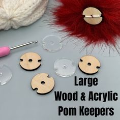 several wood and acrylic pom keepers are shown with the words large wooden and acrylic pom keepers