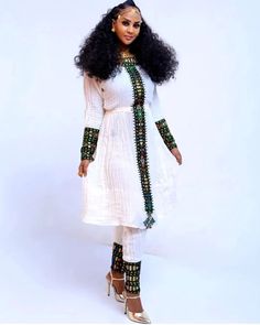 Handwoven Fetil Ethiopian Cultural Dress Habesha Kemis Habesha Libs es0079 White Folk Dress With Weaving Work, Fitted Habesha Kemis With Traditional Patterns For Ceremonies, Traditional White Handwoven Dress, Traditional Fitted White Habesha Kemis, Traditional White Fitted Habesha Kemis, Transitional White Cotton Dress, White Cotton Dress With Traditional Drape, Fitted Cotton Dresses With Traditional Patterns, Transitional White Traditional Wear With Woven Motifs