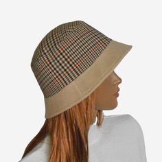 Size 57-58 cm  Women's bucket hat. This is a fashionable and stylish hat for the cold season. Winter hat with small brim. The women's hat is made of checkered fabric and monochrome brown fabric with a slight shiny effect.  Beautiful combination of colors - beige and brown.  Hat with warm lining. Checkered Fabric, Brown Hat, Stylish Hats, Winter Hats For Women, Brown Fabric, Cold Season, Bucket Hats, Brim Hat, Season Winter