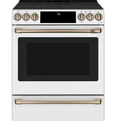 a white oven with gold trim and two burners on the front, and an oven door