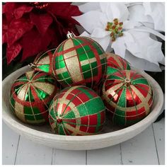 christmas ornaments in a bowl on a table