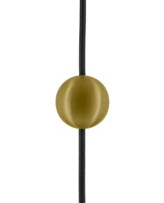 a round object hanging from a black cord