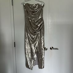 This Is A Never Worn Silver Sequin Gown By The Brand Lbv. Strapless, Side Slit, Nice Draping Near The Waist. Women’s Size 8. Gown Is Both Floor Length (Unless You Are Shorter Than 5’4), More Like Ankle Length. Super Chic. Offers/Bundles Welcome. Silver Gown, Sequin Gown, Silver Sequin, Asymmetrical Dress, Ankle Length, Floor Length, Strapless Dress, Sequin, Bundles