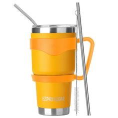 a yellow cup with two straws in it