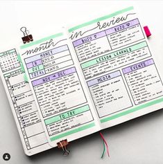 an open planner book with notes on it