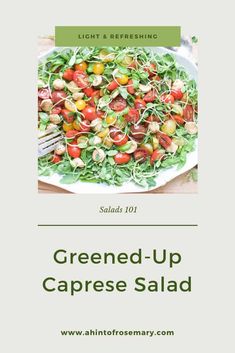 a white plate filled with salad on top of a table