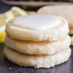 a stack of lemon shortbread cookies with icing