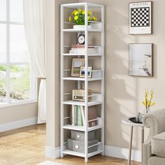 a white bookcase in the corner of a room