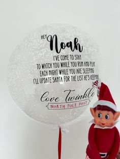 the elf is next to a balloon that says, he noah i've come to stay