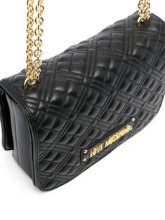 Find MOSCHINO Quilted Shoulder Bag on Editorialist. This Love Moschino shoulder bag is crafted from quilted leather with a gold-tone logo plaque. It features a foldover top, a chain-link shoulder strap, and a main compartment. Quilted Shoulder Bag, Across Body Bag, Love Moschino, Quilted Leather, Moschino, Chain Link, Shoulder Strap, Shoulder Bag, Luxury Fashion