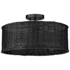 a black ceiling light with wicker shades