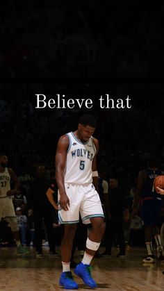 a man standing on top of a basketball court with the words believe that in front of him