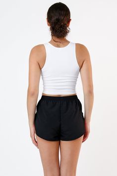 This crop tank is made of a heavy 2x1 rib with spandex so it has a flattering stretch. This textile features more compression than our regular cotton spandex styles and has been garment dyed and washed, so it is shrink-free, in 3 basic colors for your wardrobe. Compared to our regular 100% cotton 2x1 crop tank, this garment is better for working out and has a sexier, tighter fit. Made in Los Angeles, Calif. Our experienced seamstresses earn an average up to $20 an hour or more and no less than $ Black Sleeveless Crop Top, Royal Colors, Black And White Baby, Black Turtleneck, Sleeveless Crop Top, Basic Tops, Black Sleeveless, Basic Colors, Crop Tank