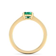 This elegant ring features a stunning oval emerald stone set in lustrous white gold. The vibrant green hue of the emerald is beautifully complemented by the brilliance of the white gold band, creating a timeless and sophisticated piece of jewelry. Metal: 14K Gold Setting Type: Prong Rhodium Finish: Yes, on White Gold Gemstone Details: Gemstone: Emerald Shape: Oval Average Dimensions: 8.00 x 6.00 MM Quantity: 01 Average Cut: Very Good Average Color: Medium to Dark Green Average Clarity: Eye Clean Dance Jewelry, Gold G, Jewelry Metal, Birthstone Gifts, Ring Pendant Necklace, Emerald Stone, White Gold Band, Elegant Ring, Vibrant Green