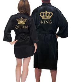 PRICES MAY VARY. 👑 CLASSY BRIDE “KING & QUEEN” SATIN ROBES: These matching robes for the couples come with QUEEN, KING & matching gold crowns embroidered on the back. The King & Queen crowns exude luxury and are a playful way to celebrate an anniversary, marriage, or the Holidays. These black satin robes are a sleek solid black. 👑 SILKY SOFT TOUCH: Our kimono style black satin robes are made of a premium satin charmeuse blend that feels soft as silk. These his and her robes come with an interi Royal Robes, Queen Status, Queen Crowns, Gold Crowns, Matching Sweatsuit, Classy Bride, Halloween Jars, Queen Gifts, Satin Robes