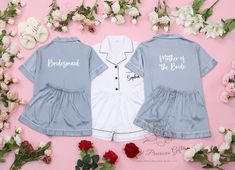 This personalized bridesmaid pajama set is crafted from high-quality satin fabric that feels as delicate and soft as silk. It ensures a skin-friendly experience without irritation or itching, making it perfect for everyday wear. The design pays close attention to detail, featuring a short-sleeve button-down top and drawstring-free shorts, providing both comfort and style for adults. This set makes an ideal gift for a variety of occasions, including bridal showers, bachelorette parties, birthdays White Satin Pajama Party Sets, White Bridesmaid Gift Sets, Fitted Satin Set For Wedding Night, White Satin Sets For Wedding Night, Blue Short Sleeve Sets For Wedding, Blue Satin Pajama Party Set, White Sets For Bridesmaid Gift, Spa Retreats, Bridesmaid Pajama