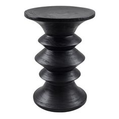 a black wooden stool sitting on top of a white background