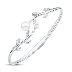 This gorgeous foliage-inspired bangle for her features a lovely leaf design set in classic sterling silver. Sparkling round and navette-cut white lab-created sapphires accent the leaves, and the center is graced by a freshwater cultured pearl. Elegant White Sterling Silver Bangle, Elegant White Gold Sterling Silver Bangle, Alternative Metal, White Lab, Kay Jewelers, Pearl Types, Sapphire Stone, Precious Jewelry, Pink Pearl