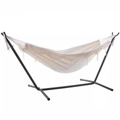 a white hammock with two black legs and an ivory colored net hanging from it