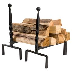 a stack of logs sitting next to each other on top of metal stand with black legs