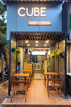 The warm ambient lighting with the combination of greeneries around give the customers a pleasant spot to chill and refresh Mini Cafeteria, Bistro Interior, Food Stall Design, Juice Bar Design, Restaurant Exterior Design, Coffee House Design, Restaurant Design Inspiration, Bakery Design Interior